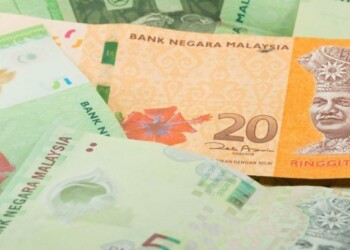 Ilustrasi Malaysia's central bank on Thursday kept its benchmark interest rate unchanged for the second consecutive meeting. (IST)